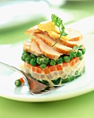 Timbale of mixed vegetables and thinly sliced chicken
