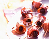 Prunes wrapped in bacon
