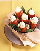 Strawberries filled with whipped cream