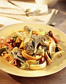 Multicolored pasta with artichokes