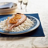 Pink sea bream with preserved lemon, on bed of rice