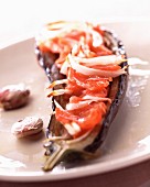 Aubergine stuffed with tomato and onion