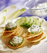 Blinis with cucumber and cream