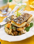Piece of bass grilled with old-fashioned vegetables