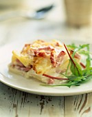 Gratin Dauphinois with diced bacon and ham