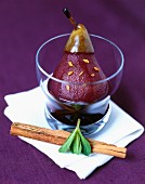 Poached pear in spicy red wine