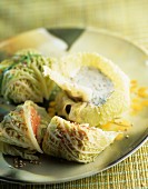 Cabbage stuffed with salmon and sesame cream