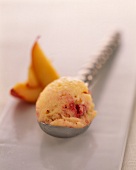 Scoop of raspberry, orange blossom and apricot ice cream