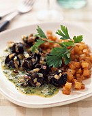 Snail fricasée in parsley sauce with pan-fried Swedish turnips