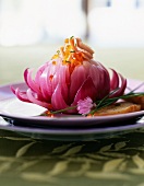 Red onion stuffed with creamed salmon