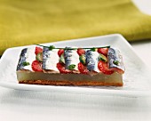 sardine tart with strawberries and cucumber jelly