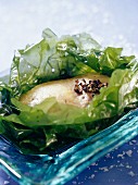 Duck foie gras cooked in sea lettuce