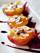 Roast apricots with poppy flowers and flaked almonds