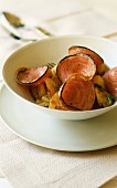 Andouille (Kaldaunenwurst) mit Kartoffeln