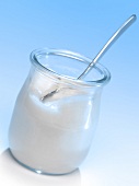 Glass pot of plain yoghurt
