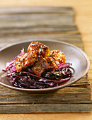 Caramelized duck with red cabbage and prunes and coffee sauce