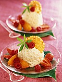 Rice pudding with vanilla, fruit salad with orange wafers