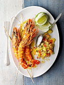 Grilled gambas and tabbouleh with exotic fruit