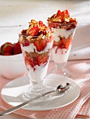 Quark desserts with strawberries and dried fruit