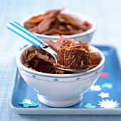 Chocolate mousse topped with chocolate flakes