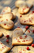 Heart-shaped shortbread biscuits with pink peppercorns