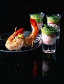 Crab jelly in glasses and prawns with sesames seeds