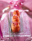 Smoked salmon rolls with beetroot shoots