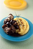 Rabbit ,olive and rosemary stew with polenta