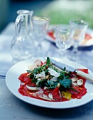 Beef and button mushroom carpaccio,pine nuts and parmesan