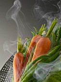 Steam cooking vegetables