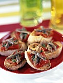 Tomato and anchovy Crostinis