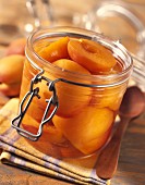 Jar of apricots in syrup