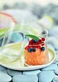 Melon sherbet ice with summer fruit