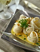 Rolled sole fillets in creamy curry sauce