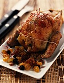 Roast pigeon with almonds