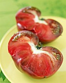 Halved Black Krim beefsteak tomatoes