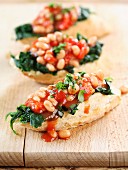 Baked beans and spinach on toast