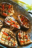 Grilled squared eggplants with tomatoes