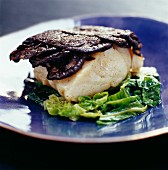 Cod with black pudding and cabbage