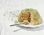 Stuffed cabbage with salmon and porridge