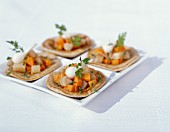 Blinis with carrots and herring
