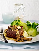 Thick beef steak with mushrooms,mashed potatoes and Pak choi cabbage