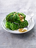 Small cabbages stuffed with tofu and quinoa