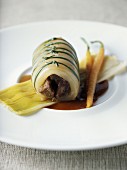 Young calf's head stuffed with truffles and glazed with leeks