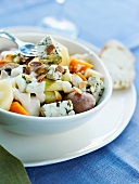 Vegetarian Pot-au-feu with parsley butter and almonds