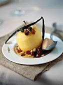 Oven-baked apple with dried fruit and vanilla