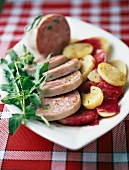 Pistachio saucisson from Lyon with potatoes and beetroot dressing