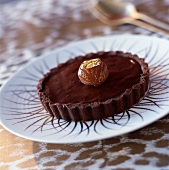 Chocolate ,chestnut cream and raisin with cognac tarlet
