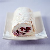 Rolled white and raspberry log cake