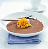 Chocolate soup with fruit